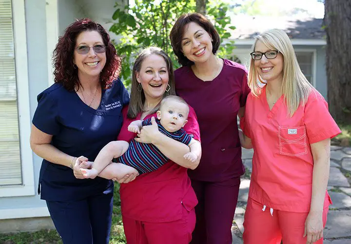 Bayou City Breastfeeding IBCLC team with infant in Houston