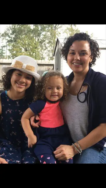 Tessa Posing With Her Two Children Image in Color