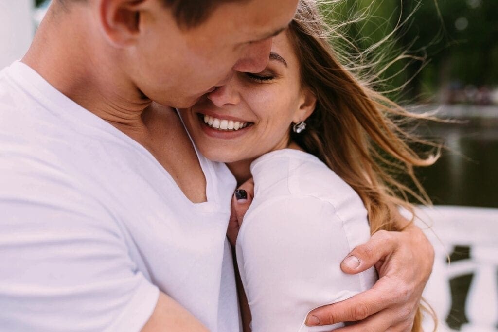 Picture of man hugging woman