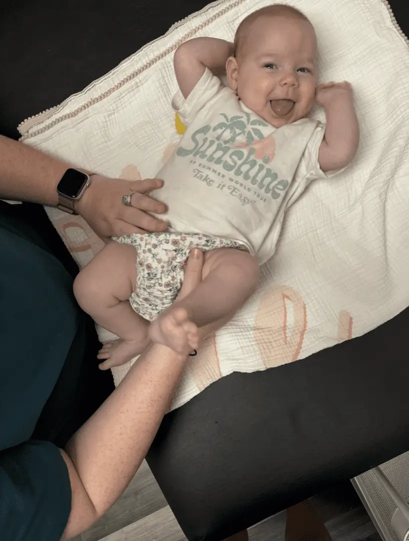 A baby during an infant bodywork session.
