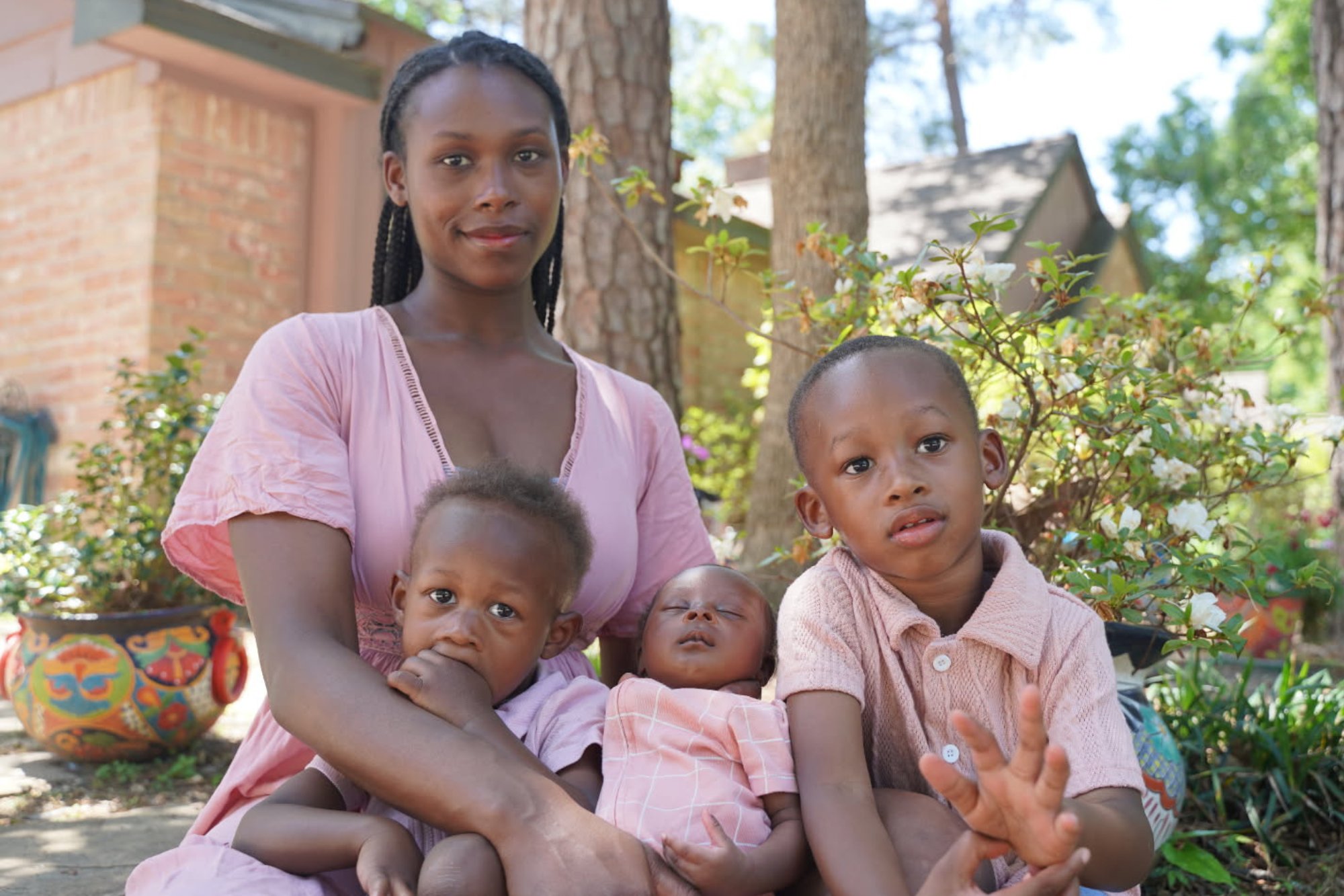 A parent and baby together, representing covered preventive care