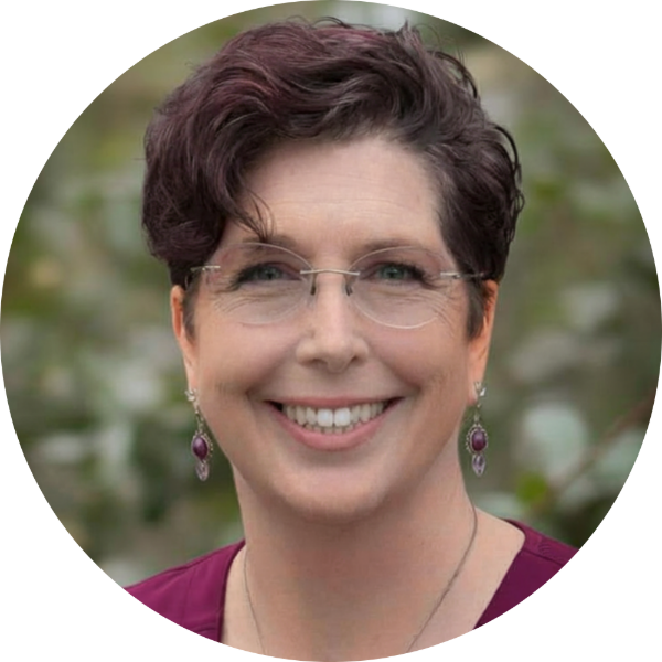 Portrait of Suzanne Juel, IBCLC, smiling outdoors, co-instructor of the Breastfeeding Blueprint class.