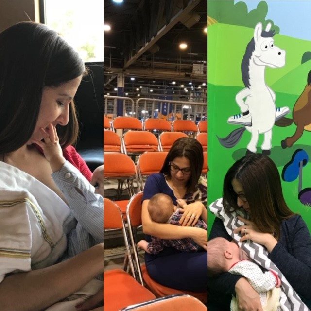 A mother nursing her baby while seated in an arena.