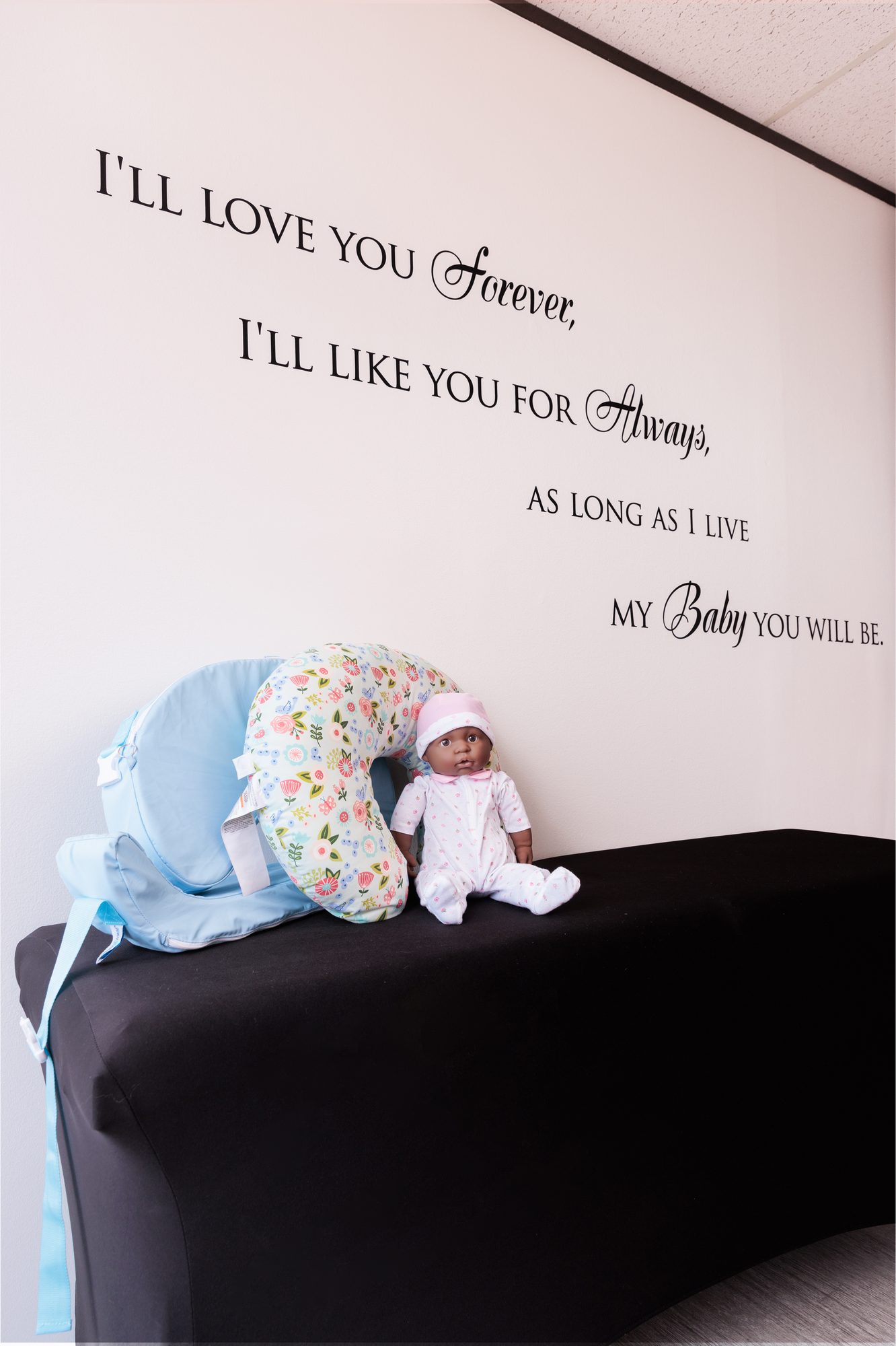 Wall lettering that reads &lsquo;I&rsquo;ll love you forever, I&rsquo;ll like you for always&rsquo;